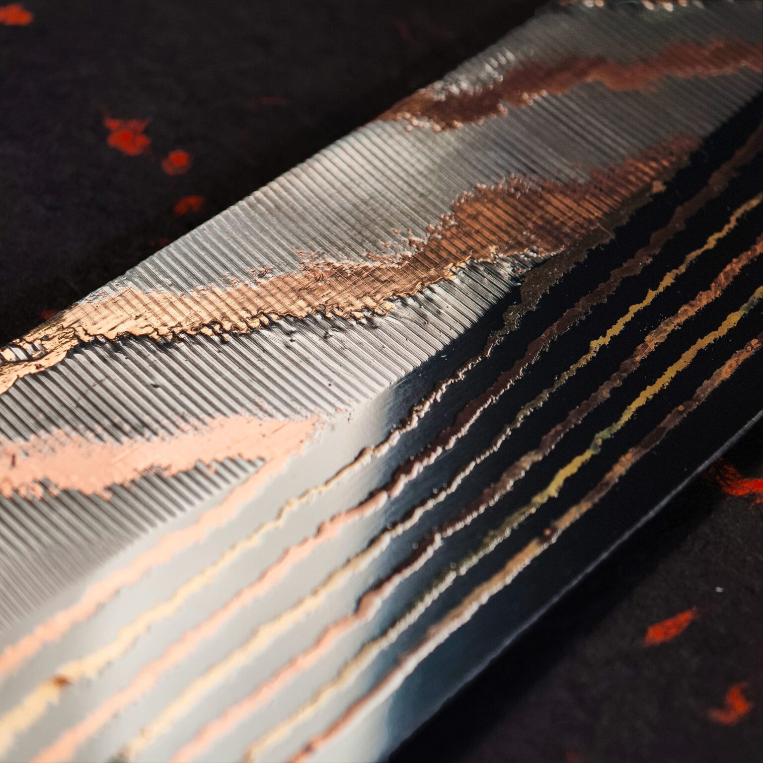 FORGE Blood & Fire copper Damascus chef's knife, burnt copper and melted brass blade surface
