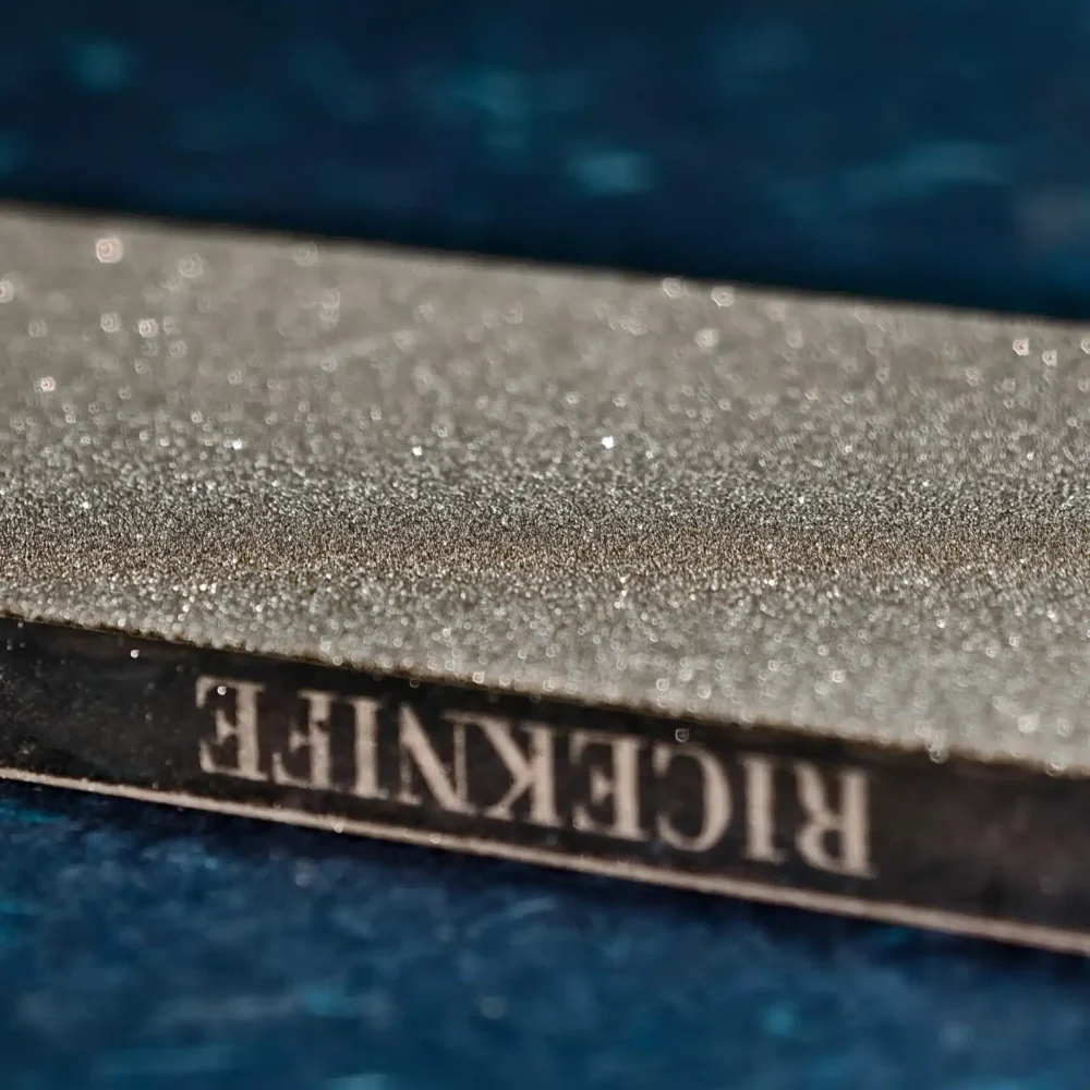 Close-up of the diamond-coated surface of the RICEKNIFE plated diamond sharpening stone