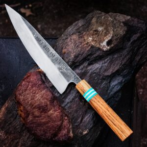 VALKYRIE III Damascus chef's knife with a long blade and a wooden handle with blue bands.