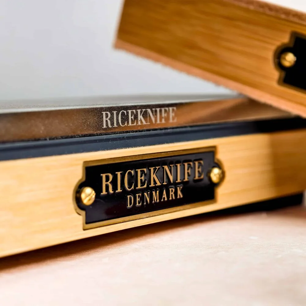 Stone holder with the RICEKNIFE Denmark badge from the beginner sharpening set